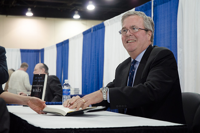 photo of Jeb Bush signing books at CPAC 2013